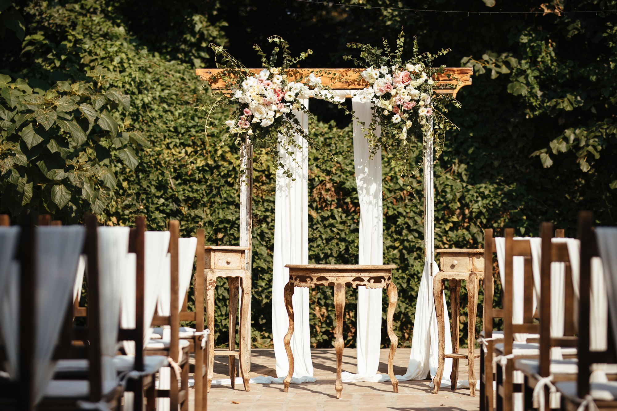 rustic wedding aisle in a garden .jpg